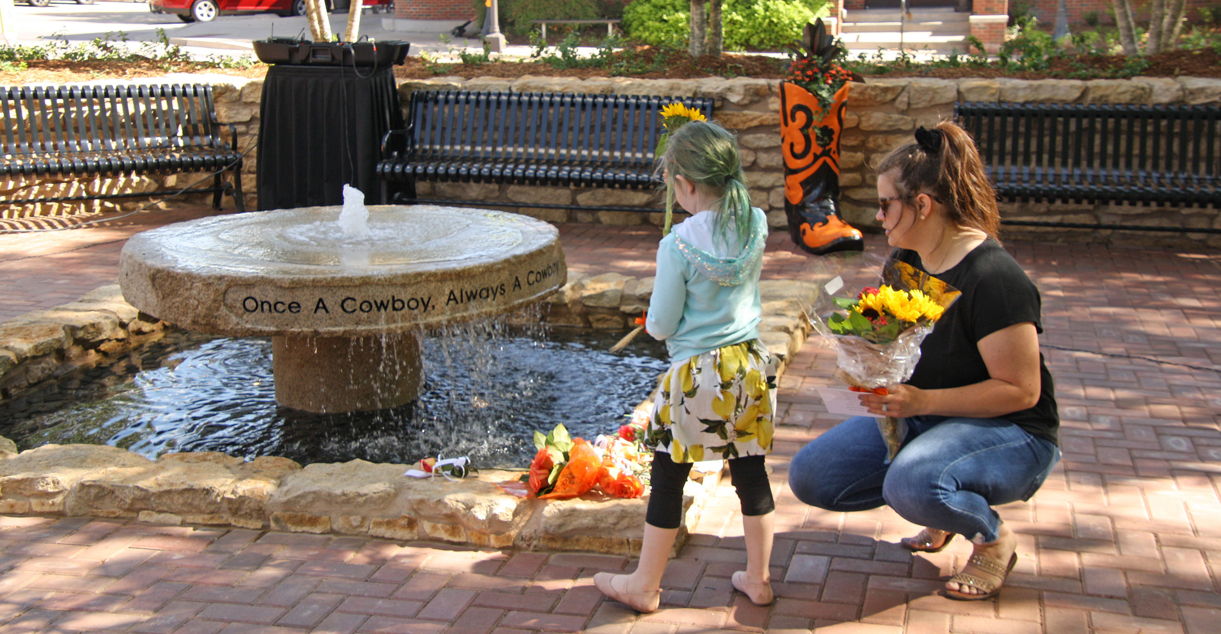 mother and daughter at remembrance garden